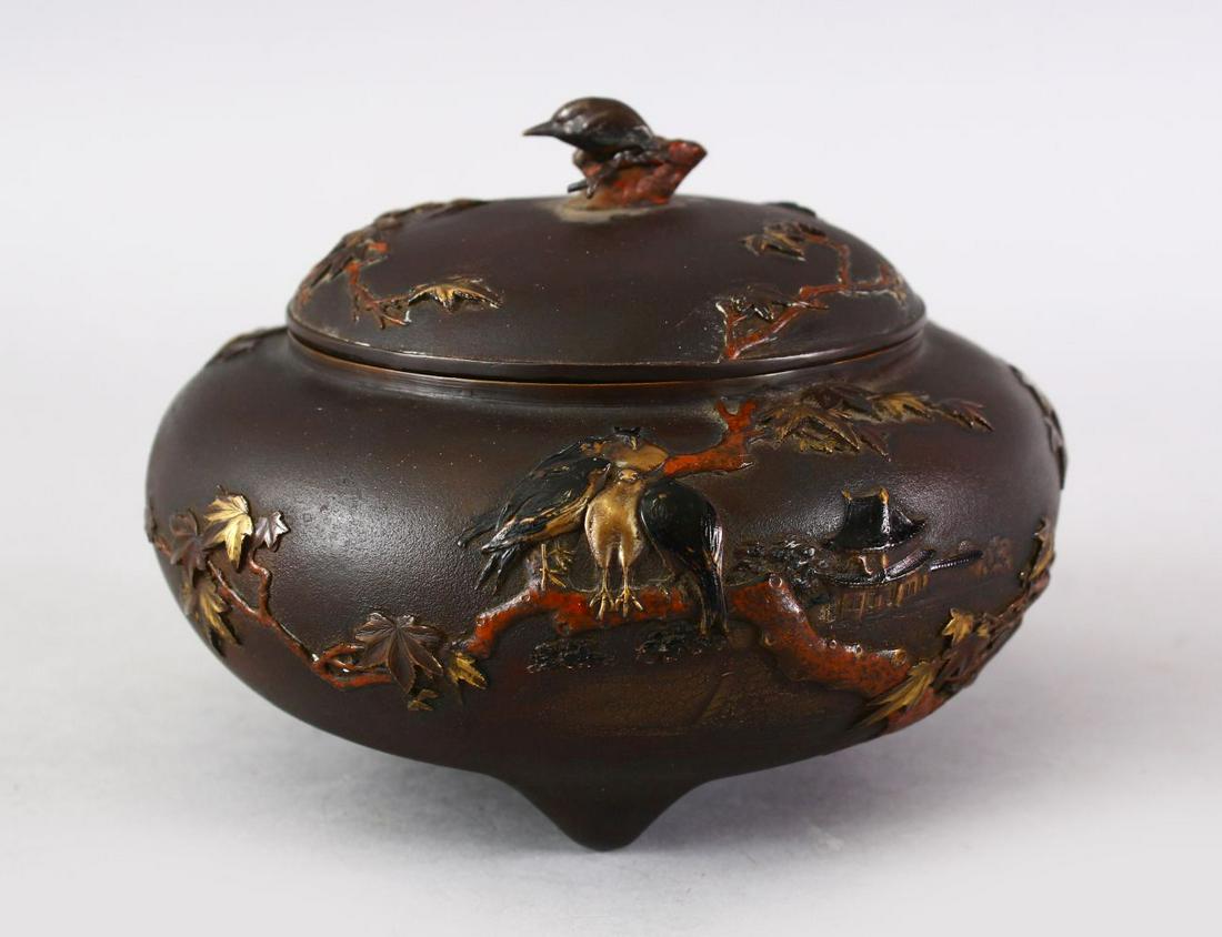 A GOOD JAPANESE MEIJI PERIOD BRONZE & MIXED METAL: A GOOD JAPANESE MEIJI PERIOD BRONZE & MIXED METAL LIDDED KORO, the body of the koro decorated with mixed metal depicting scenes of birds amongst native flora, the cover pierced with sunset and a bird 