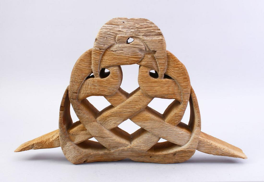 AN EARLY POSSIBLY 16TH CENTURY ISLAMIC CARVED WOODEN: AN EARLY POSSIBLY 16TH CENTURY ISLAMIC CARVED WOODEN WRITING SYMBOL, 43cm wide x 29cm high.