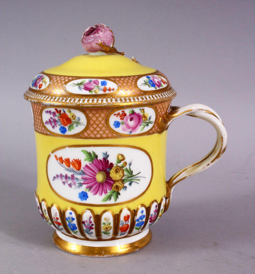 A GOOD MEISSEN PORCELAIN CUP AND COVER - FOR THE: A GOOD MEISSEN PORCELAIN CUP AND COVER - FOR THE ISLAMIC MARKET, decorated with a yellow ground, with floral panels and gilt, with a floral finial, the base with meissen mark, 14cm high x 13cm wide.