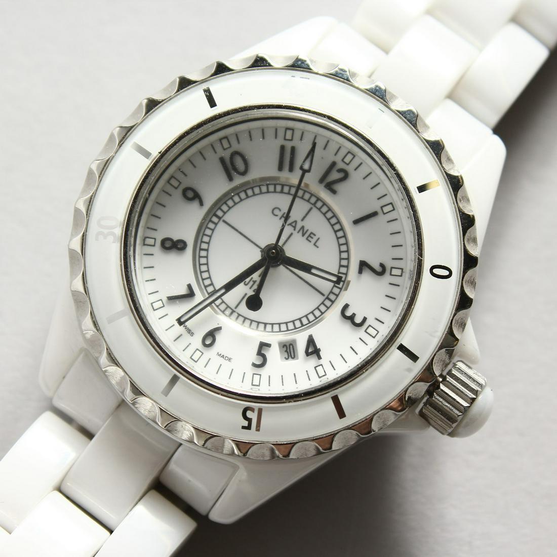 A CHANEL WHITE WRISTWATCH, No. DE 21011 