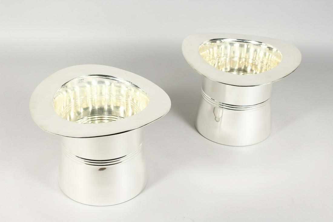 A PAIR OF PLATED TOP HAT SHAPED WINE COOLERS. 7ins: A PAIR OF PLATED TOP HAT SHAPED WINE COOLERS. 7ins high.