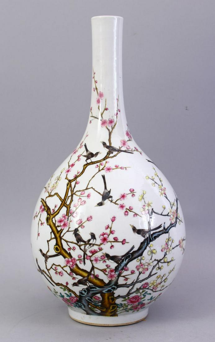 A GOOD CHINESE REPUBLIC FAMILLE ROSE PORCELAIN BOTTLE: A GOOD CHINESE REPUBLIC FAMILLE ROSE PORCELAIN BOTTLE VASE, decorated with birds and trees, the base with a qianlong mark, 39cm.