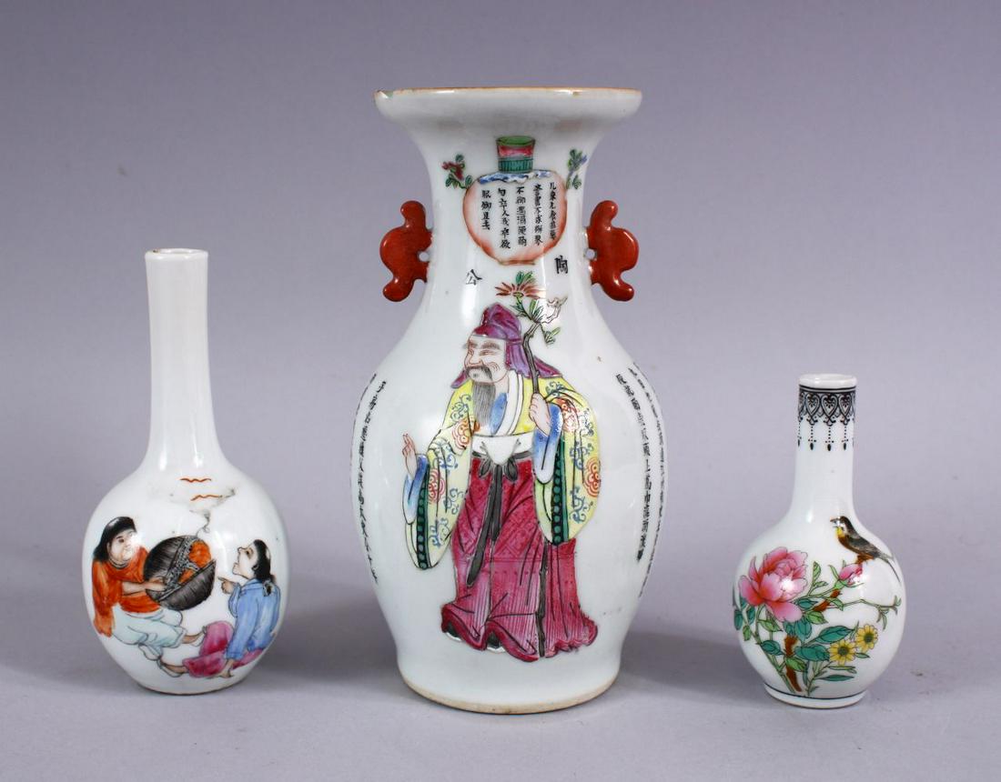 THREE CHINESE REPUBLIC PERIOD PORCELAIN VASES, one with: THREE CHINESE REPUBLIC PERIOD PORCELAIN VASES, one with twin handles and calligraphy with figure decoration, 17cm, one smaller vase with two figures seated, base with iron red mark, 12.5cm, and a smal