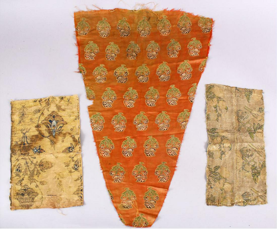 THREE 17TH CENTURY PERSIAN SAFAVI TEXTILE FRAGMENTS, (1 of 2)