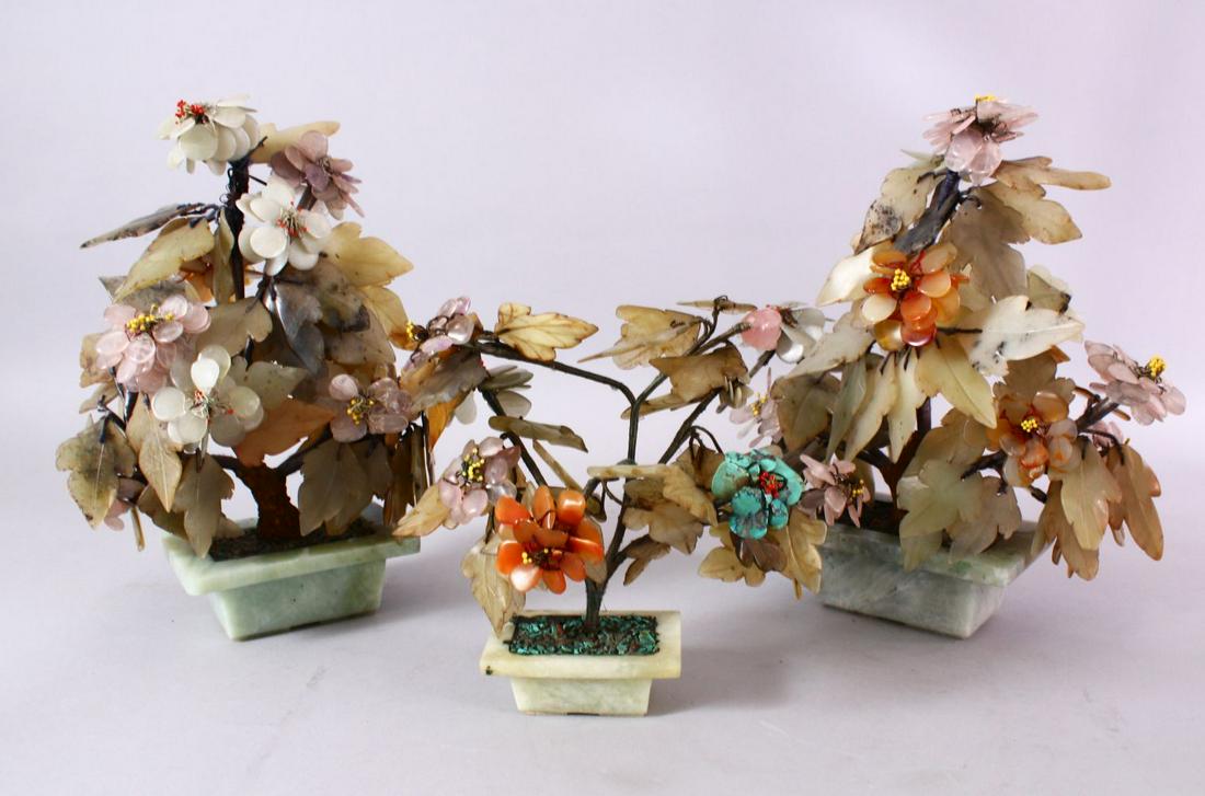 THREE CHINESE CARVED JADE MODEL TREES, each in carved (1 of 8)