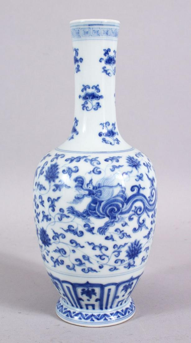 A CHINESE MING STYLE BLUE & WHITE PORCELAIN DRAGON (1 of 7)