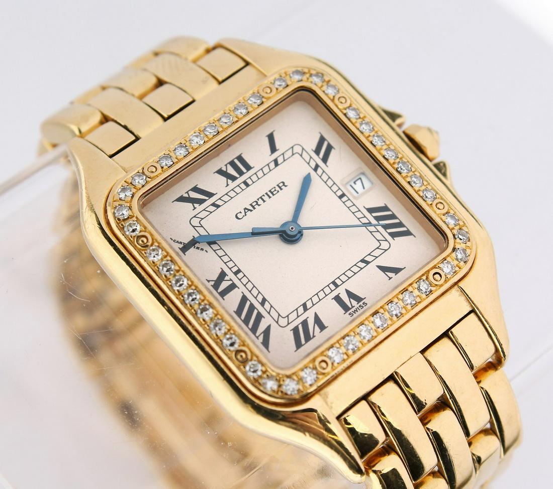 A CARTIER GENTLEMAN'S 18CT SANTOS MID SIZE WRISTWATCH,: A CARTIER GENTLEMAN'S 18CT SANTOS MID SIZE WRISTWATCH, with diamond inset bezel, date aperture, original 18ct gold bracelet strap and Cartier red leather box.