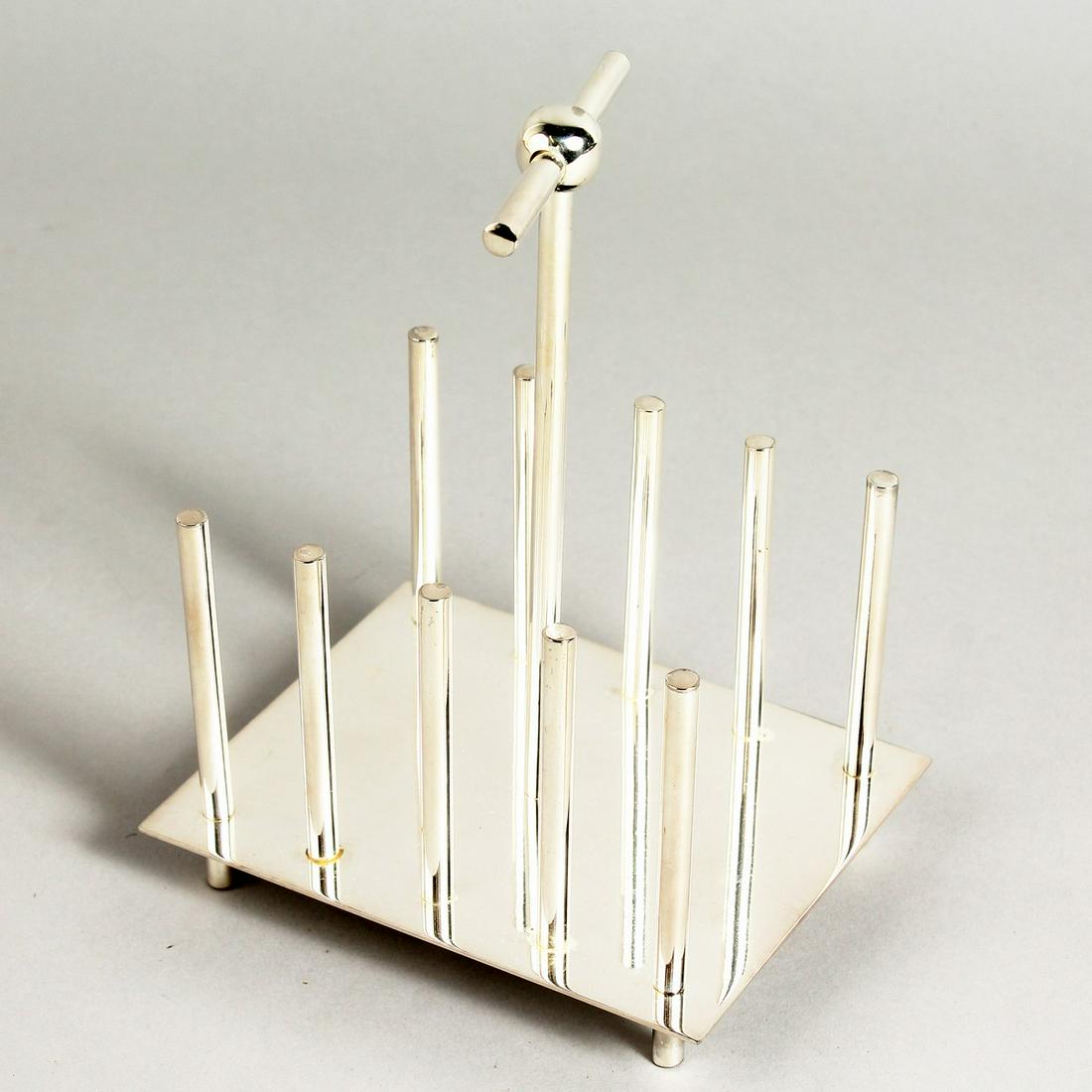 A SILVER PLATED CHRISTOPHER DRESSER DESIGN TOAST RACK.: A SILVER PLATED CHRISTOPHER DRESSER DESIGN TOAST RACK.