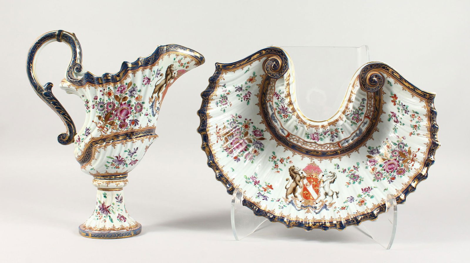 SAMSON OF PARIS, A GOOD ARMORIAL EWER WITH MATCHING: SAMSON OF PARIS, A GOOD ARMORIAL EWER WITH MATCHING SHELL SHAPED BASIN. Ewer: 12ins high. Basin: 14ins wide.