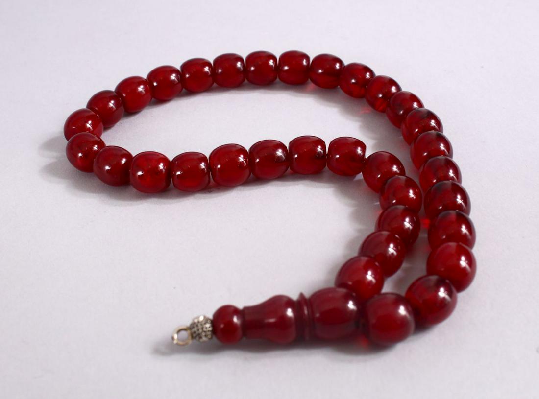 A CONTEMPORARY CHINESE CHERRY AMBER NECKLACE, approx. (1 of 1)