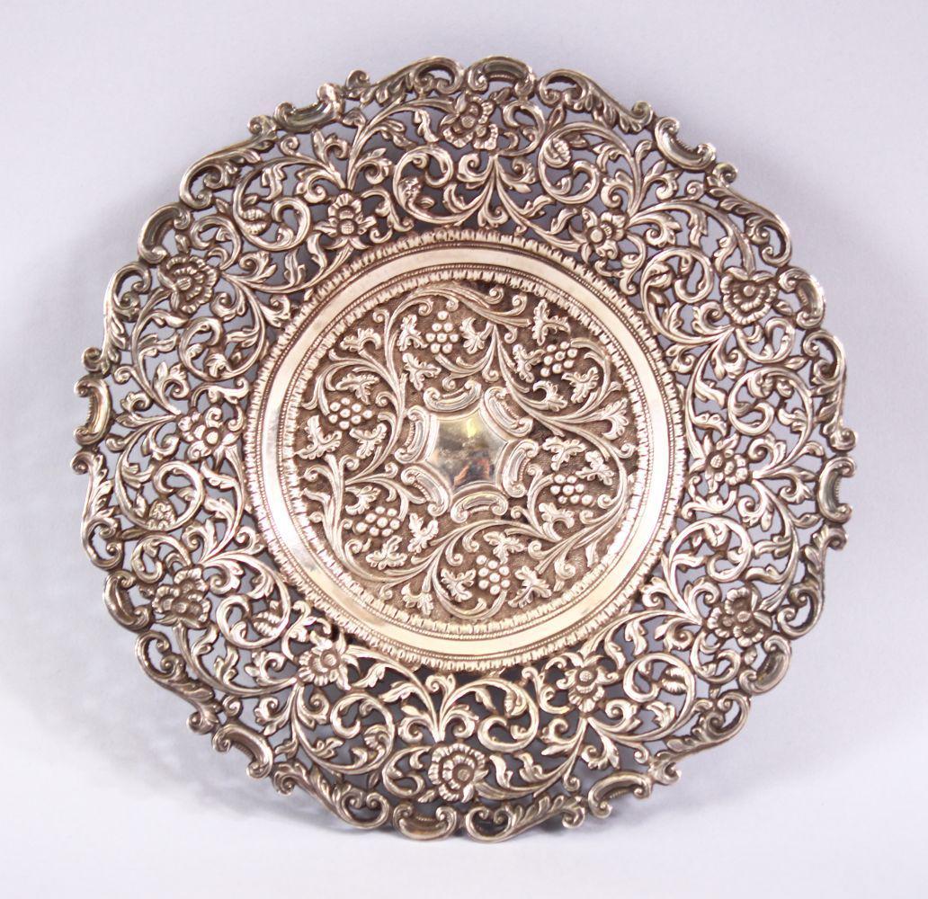 A 19TH CENTURY INDIAN SILVER OPEN WORKED DISH, with (1 of 5)