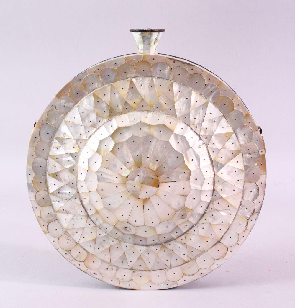 A GOOD 19TH CENTURY GOAN MOTHER OF PEARL CIRCULAR WATER: A GOOD 19TH CENTURY GOAN MOTHER OF PEARL CIRCULAR WATER FLASK, 23cm diameter.