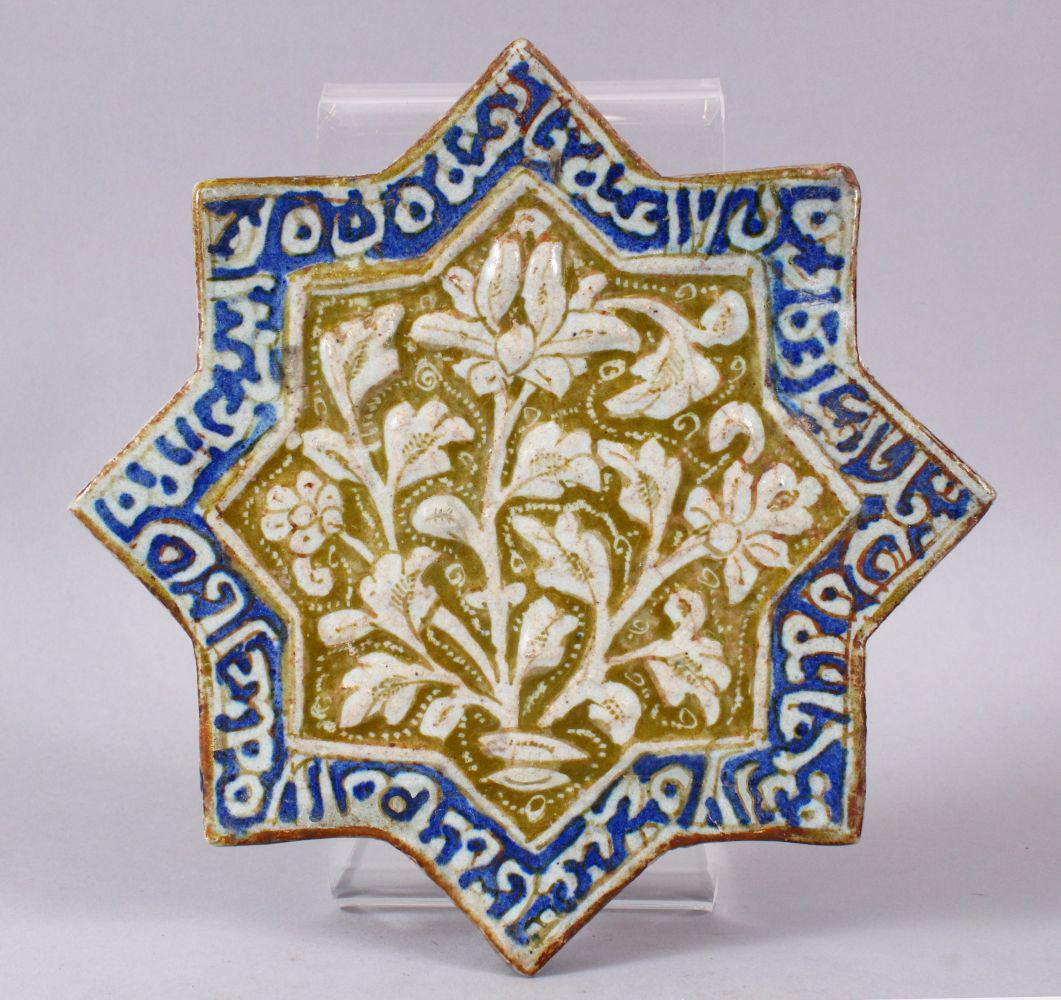 A SELJUK KASHAN STAR SHAPED POTTERY TILE, possibly 13th (1 of 6)