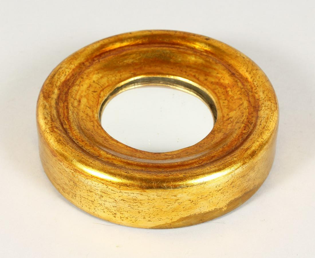 A MINIATURE GILTWOOD CONVEX MIRROR. 6ins diameter.: A MINIATURE GILTWOOD CONVEX MIRROR. 6ins diameter.