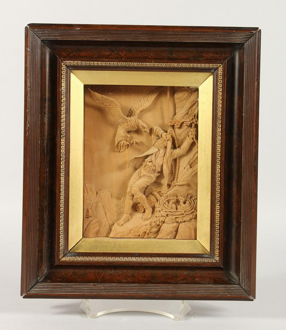 A FRAMED AND GLAZED FINELY CARVED AUSTRIAN LIMEWOOD: A FRAMED AND GLAZED FINELY CARVED AUSTRIAN LIMEWOOD PLAQUE, a Turk being attacked by an eagle. 5.5ins x 4ins.