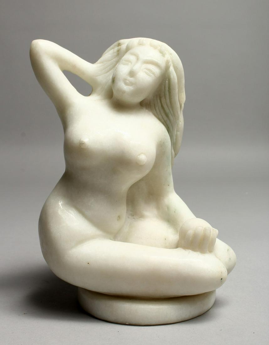 A GOOD CARVED WHITE MARBLE SEATED NUDE. 7ins high.: A GOOD CARVED WHITE MARBLE SEATED NUDE. 7ins high.