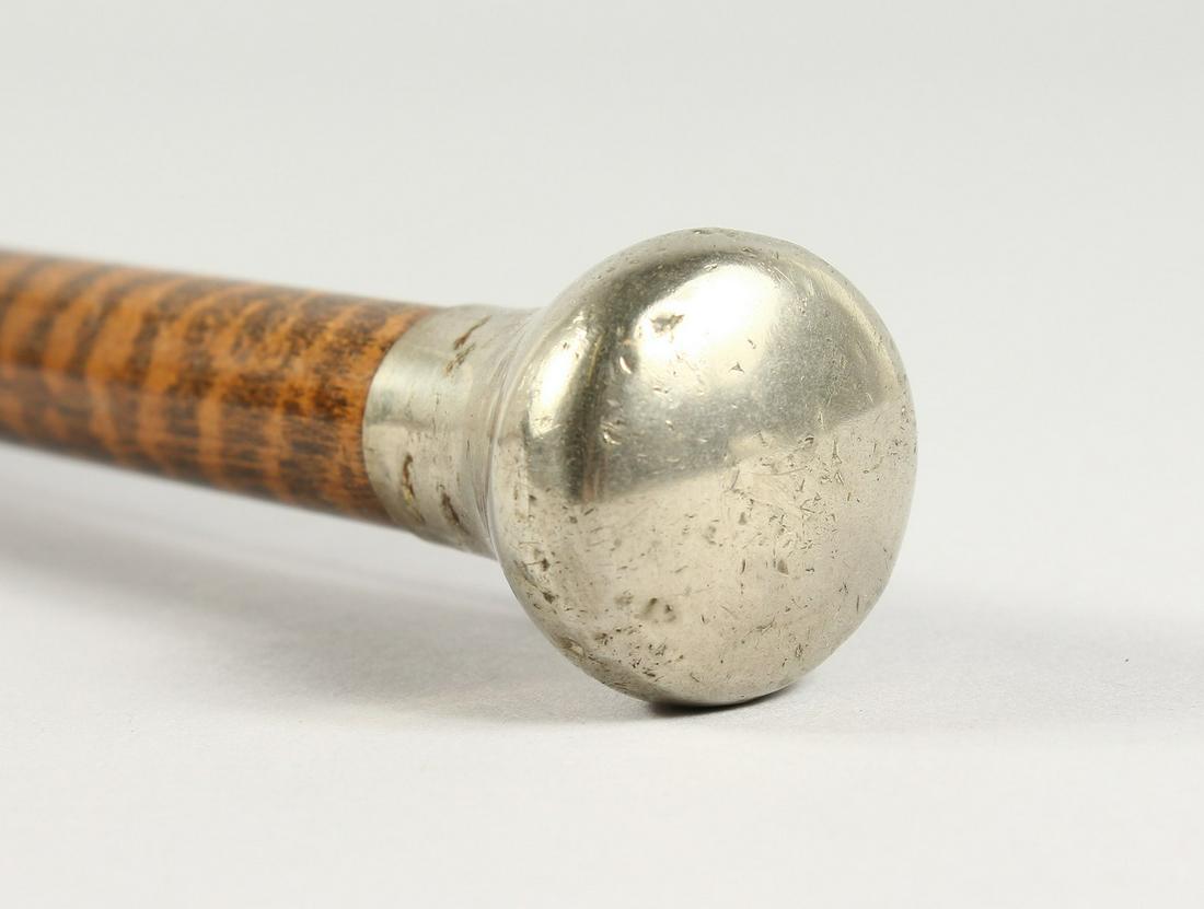A SILVER TOP LEOPARD DESIGN WALKING CANE. Stamped W.: A SILVER TOP LEOPARD DESIGN WALKING CANE. Stamped W. M. 3ft long.