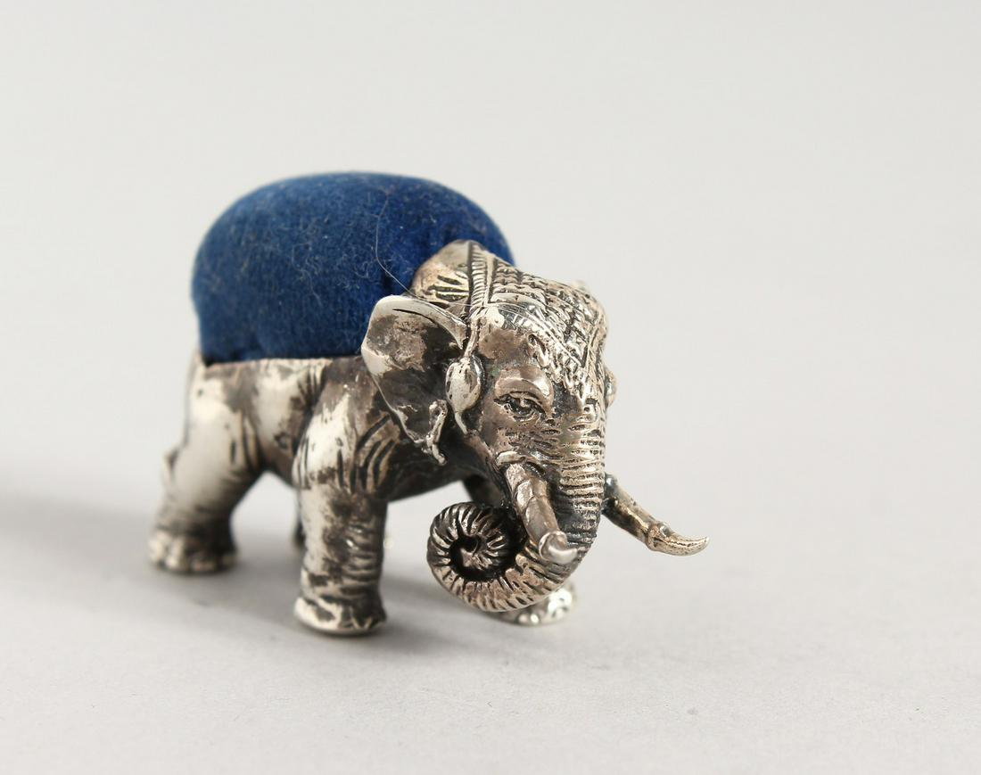 A SILVER ELEPHANT PIN CUSHION.: A SILVER ELEPHANT PIN CUSHION.