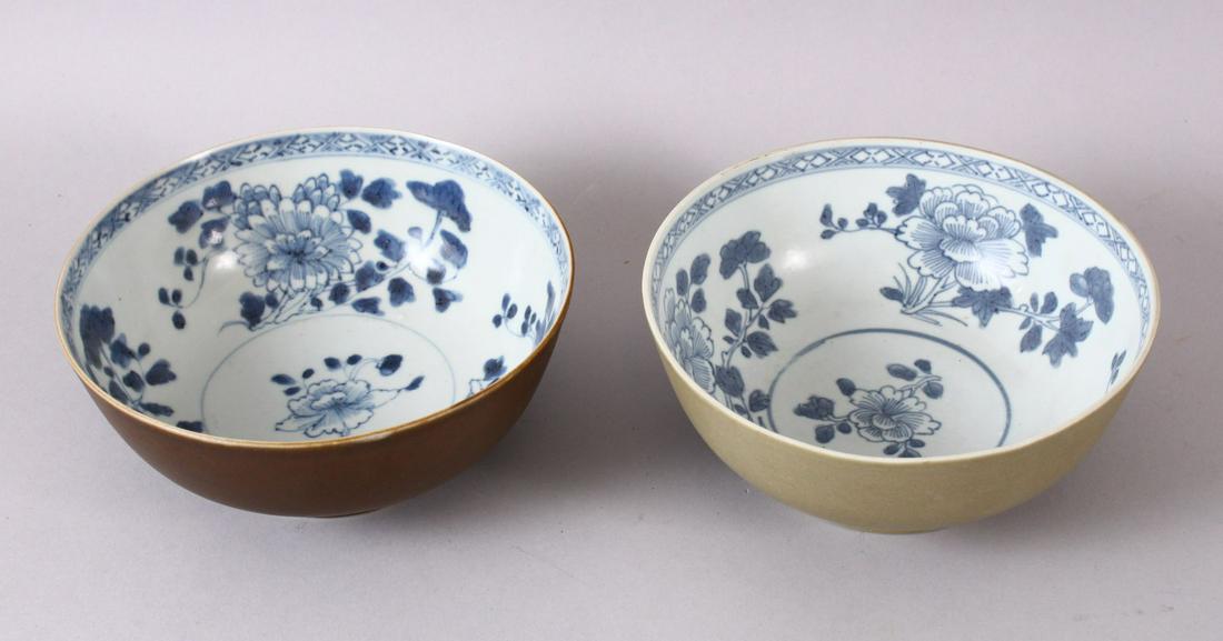 A PAIR OF CHINESE NANING CARGO BLUE & WHITE BOWLS, with: A PAIR OF CHINESE NANING CARGO BLUE & WHITE BOWLS, with a cafe au lait exterior glaze and floral blue underglaze interior decoration, 16.5cm (2)