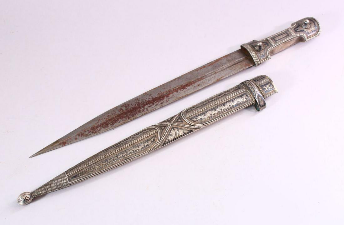 A 19TH CENTURY RUSSIAN KINJAL DAGGER with niello: A 19TH CENTURY RUSSIAN KINJAL DAGGER with niello decoration to the scabbard and hilt, 46cm long.