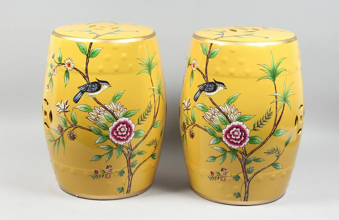 A PAIR OF CHINESE YELLOW BARREL SEATS with birch and: A PAIR OF CHINESE YELLOW BARREL SEATS with birch and flowers 17 ins high