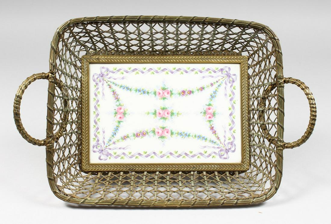 A VERY GOOD SEVRES PORCELAIN AND BASKET WORK: A VERY GOOD SEVRES PORCELAIN AND BASKET WORK TWO-HANDLED TRAY, painted with garlands of flowers and roses. Sevres mark in blue with Letter S. 12ins long x 9ins wide.