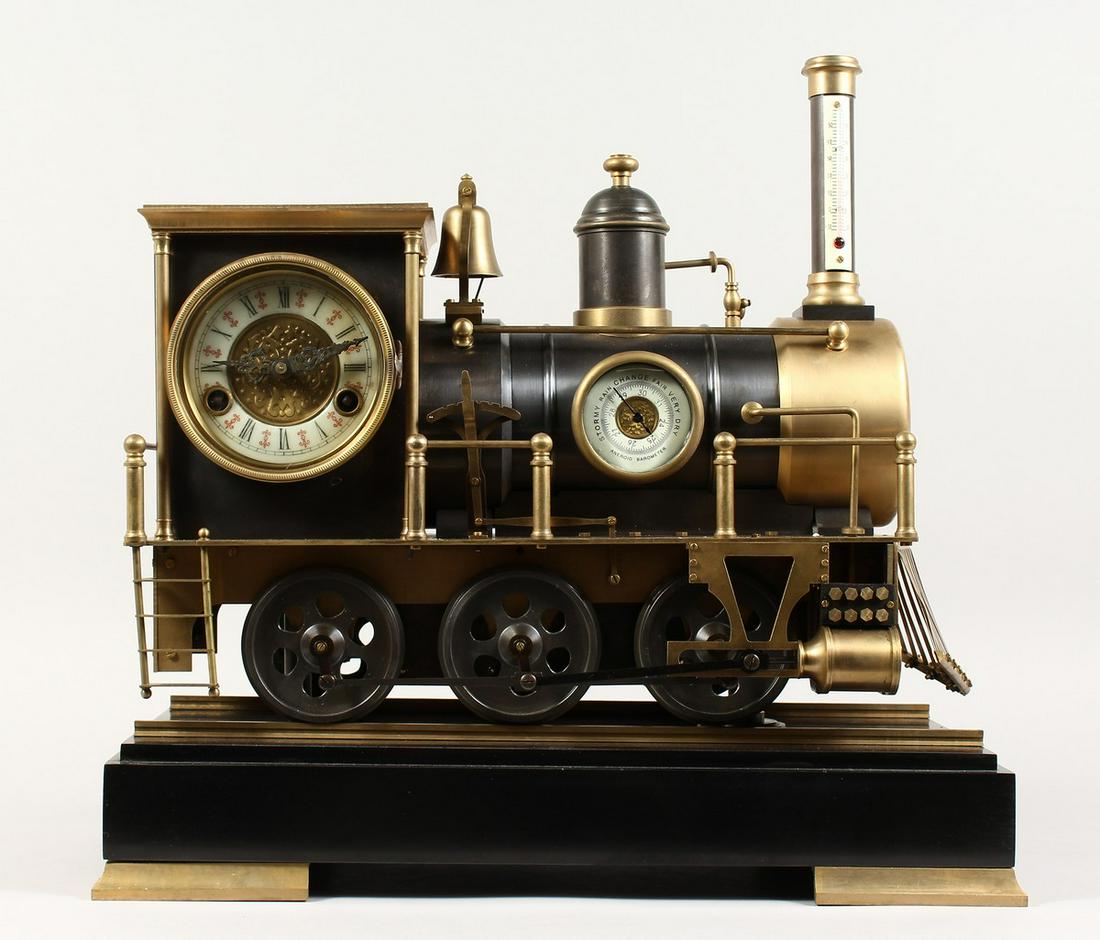 A SUPERB AMERICAN TRAIN CLOCK THERMOMETER AND BAROMETER: A SUPERB AMERICAN TRAIN CLOCK THERMOMETER AND BAROMETER on a marble base. 18 ins long