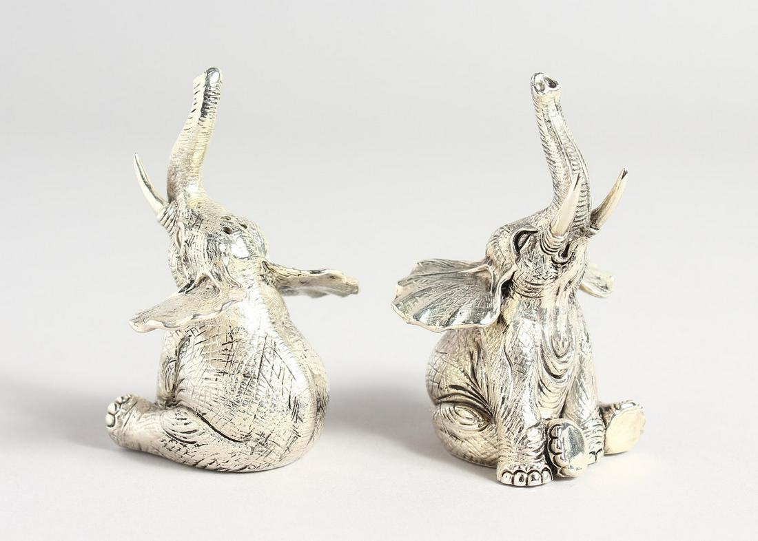 A PAIR OF 800 ELEPHANT SALT AND PEPPERS: A PAIR OF 800 ELEPHANT SALT AND PEPPERS