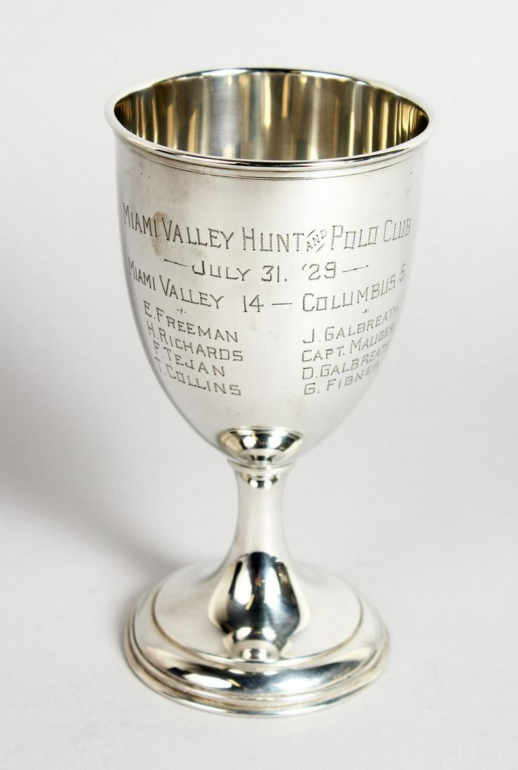 A POLO TROPHY CUP 6 ins high (MIAMI VALLEY HUNT AND: A POLO TROPHY CUP 6 ins high (MIAMI VALLEY HUNT AND POLO CLUB, JULY 31.29) Sterling silver