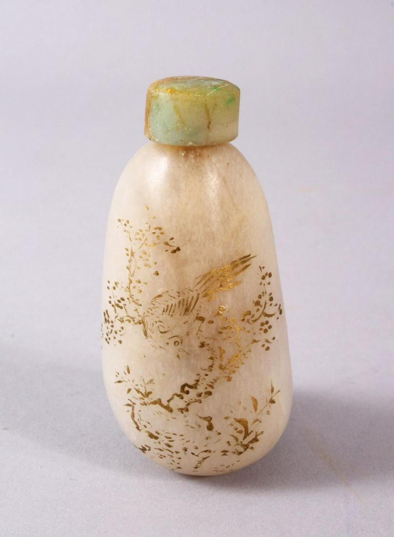 A CHINESE CARVED JADE SNUFF BOTTLE, with trace gilt (1 of 4)