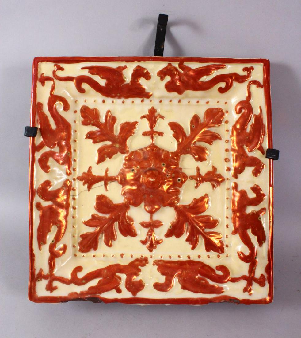 A 19TH CENTURY HISPANO MORESQUE POTTERY TILE SECTION, (1 of 3)