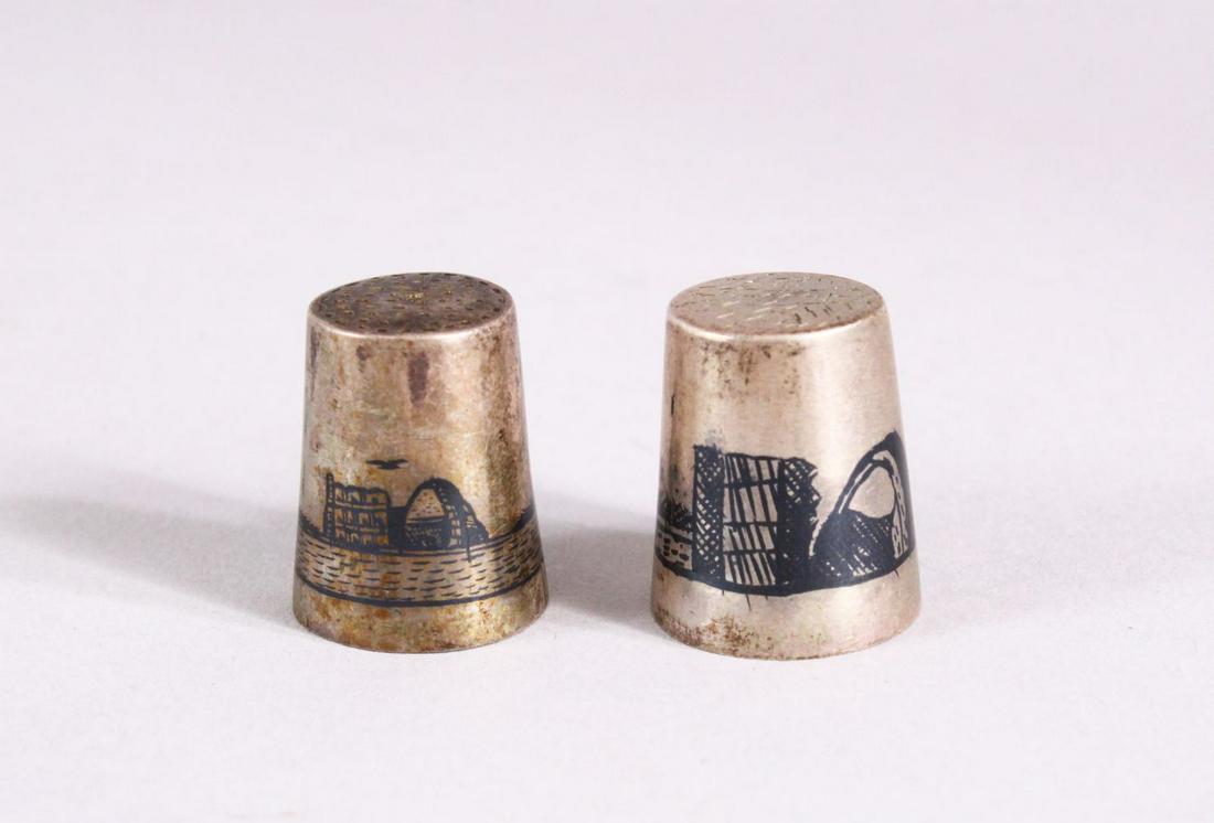 TWO 19TH CENTURY IRAQ SILVER & NIELLO INLAID THIMBLES,: TWO 19TH CENTURY IRAQ SILVER & NIELLO INLAID THIMBLES, each with inlaid landscape views,