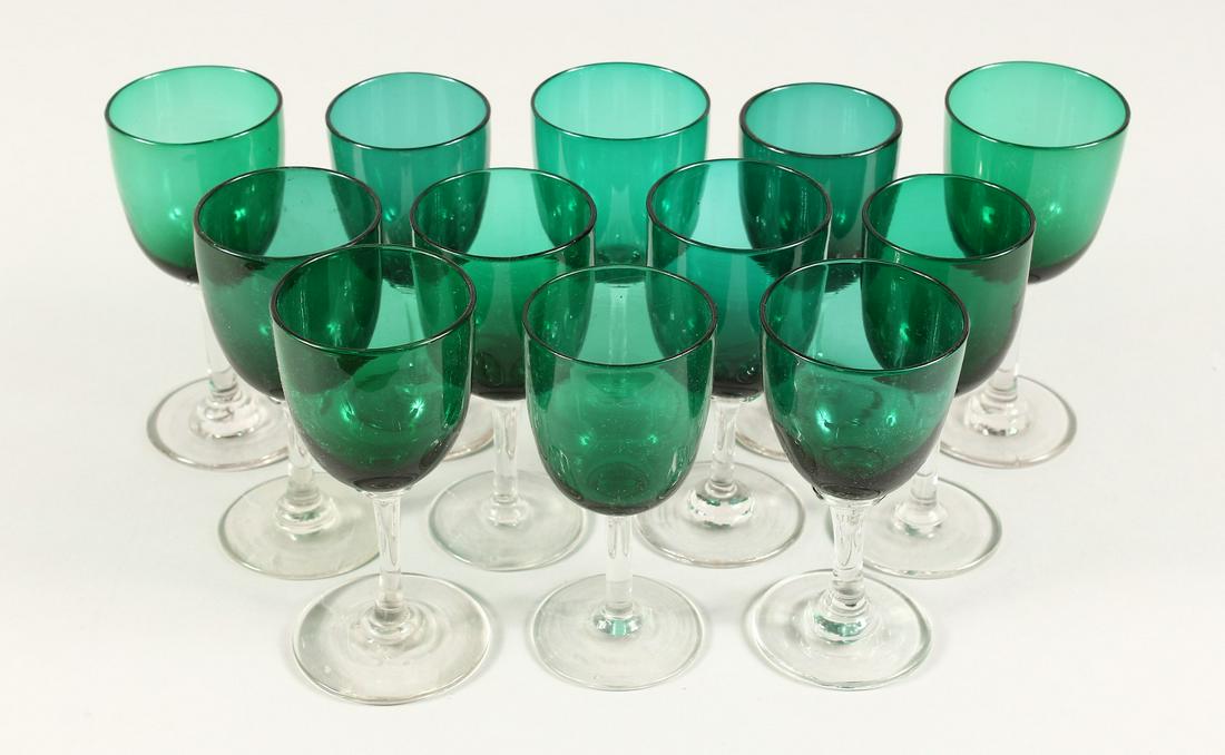 TWELVE MIXED VICTORIAN GREEN TINTED WINE GLASSES: TWELVE MIXED VICTORIAN GREEN TINTED WINE GLASSES