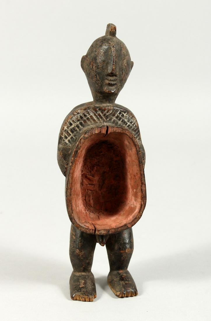 AN ANCIENT TRIBAL CARVED WOOD FIGURE 9ins high: AN ANCIENT TRIBAL CARVED WOOD FIGURE 9ins high