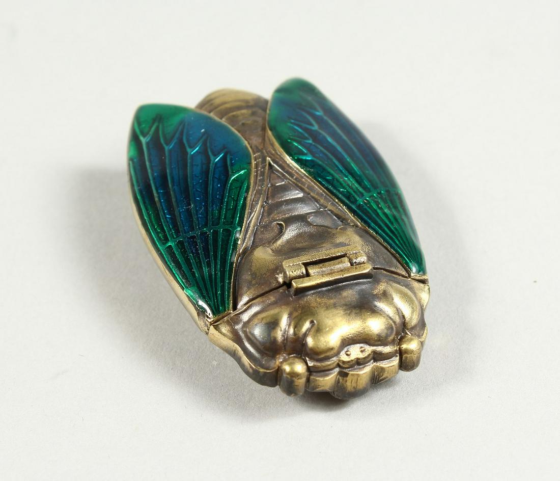 A BRASS SCARAB VESTA CASE: A BRASS SCARAB VESTA CASE