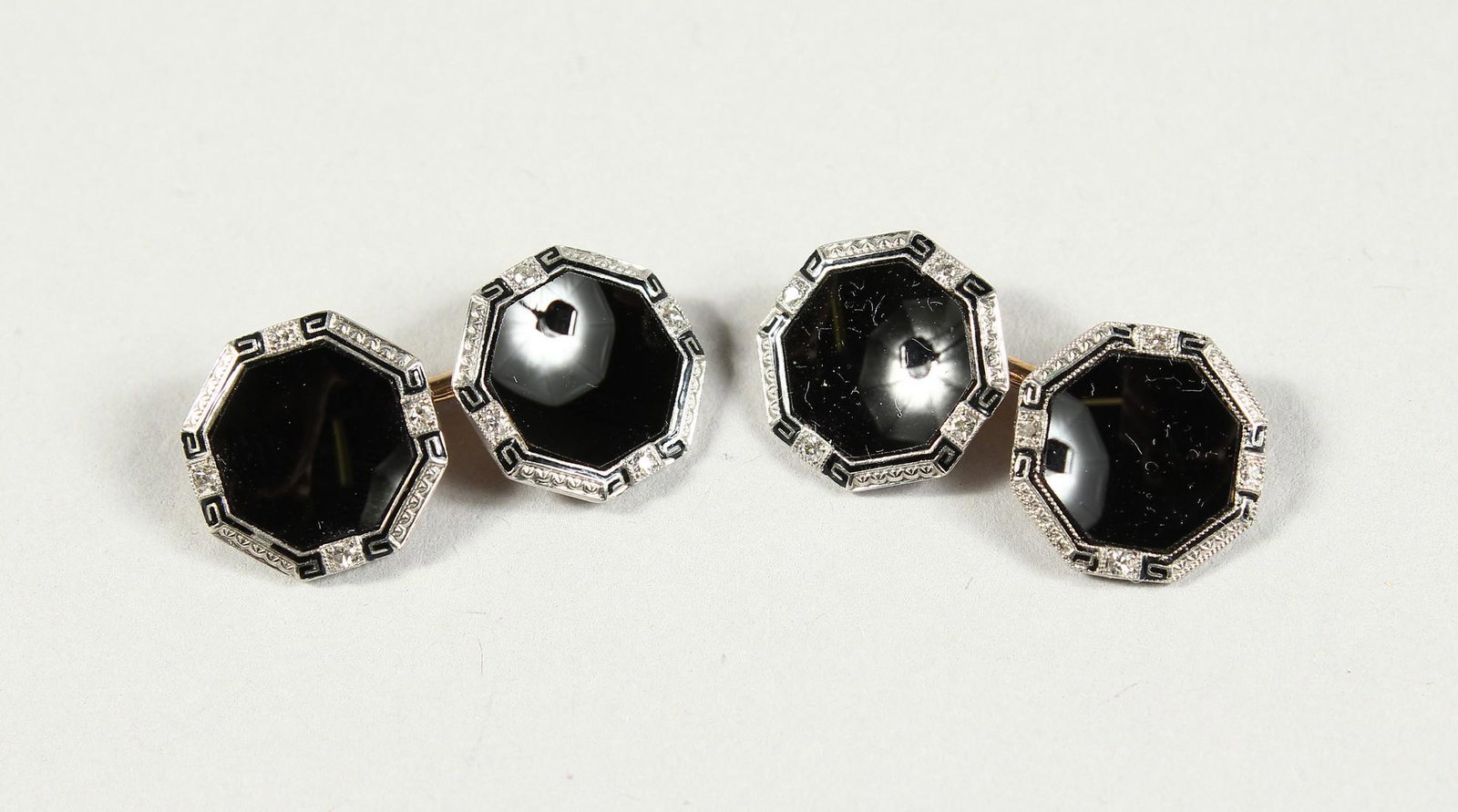 A GOOD PAIR OF GOLD AND BLACK ENAMEL DIAMOND GILT CUFF: A GOOD PAIR OF GOLD AND BLACK ENAMEL DIAMOND GILT CUFF LINKS