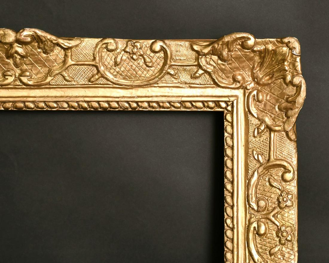 A 19th century carved wood frame, rebate size, 16" x: A 19th century carved wood frame, rebate size, 16" x 25.5", 41 x 65 cm.