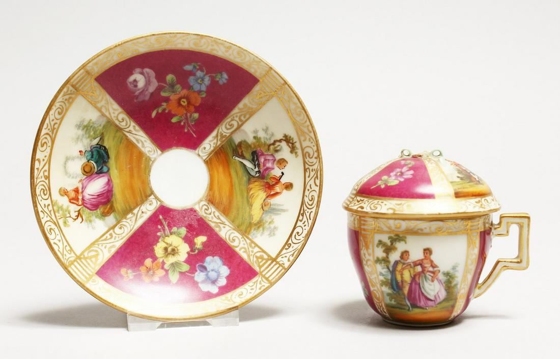 A SMALL DRESDEN AUGUSTUS REX CAUDILE CUP, SAUCER AND: A SMALL DRESDEN AUGUSTUS REX CAUDILE CUP, SAUCER AND COVER.