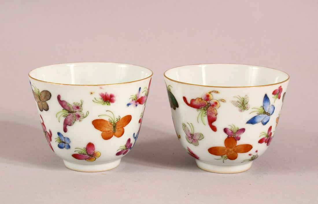 A PAIR OF CHINESE FAMILLE ROSE PORCELAIN BUTTERFLY TEA: A PAIR OF CHINESE FAMILLE ROSE PORCELAIN BUTTERFLY TEA BOWLS, each with butterfly decoration, the bases with seal marks, 6.5cm