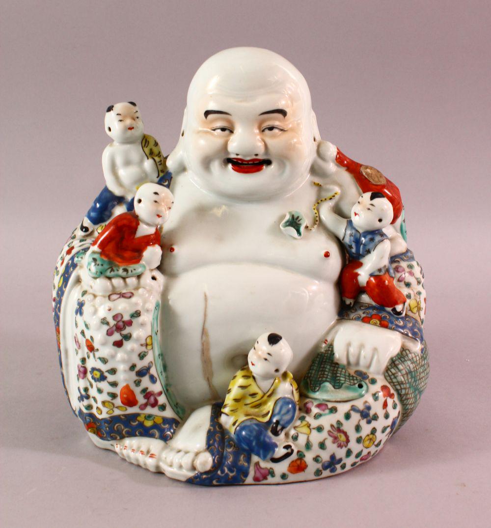 A GOOD CHINESE REPUBLIC PERIOD FAMILLE ROSE PORCELAIN: A GOOD CHINESE REPUBLIC PERIOD FAMILLE ROSE PORCELAIN FIGURE OF BUDDHA, seated with young attendant, the base with an oval impressed seal mark, 26cm
