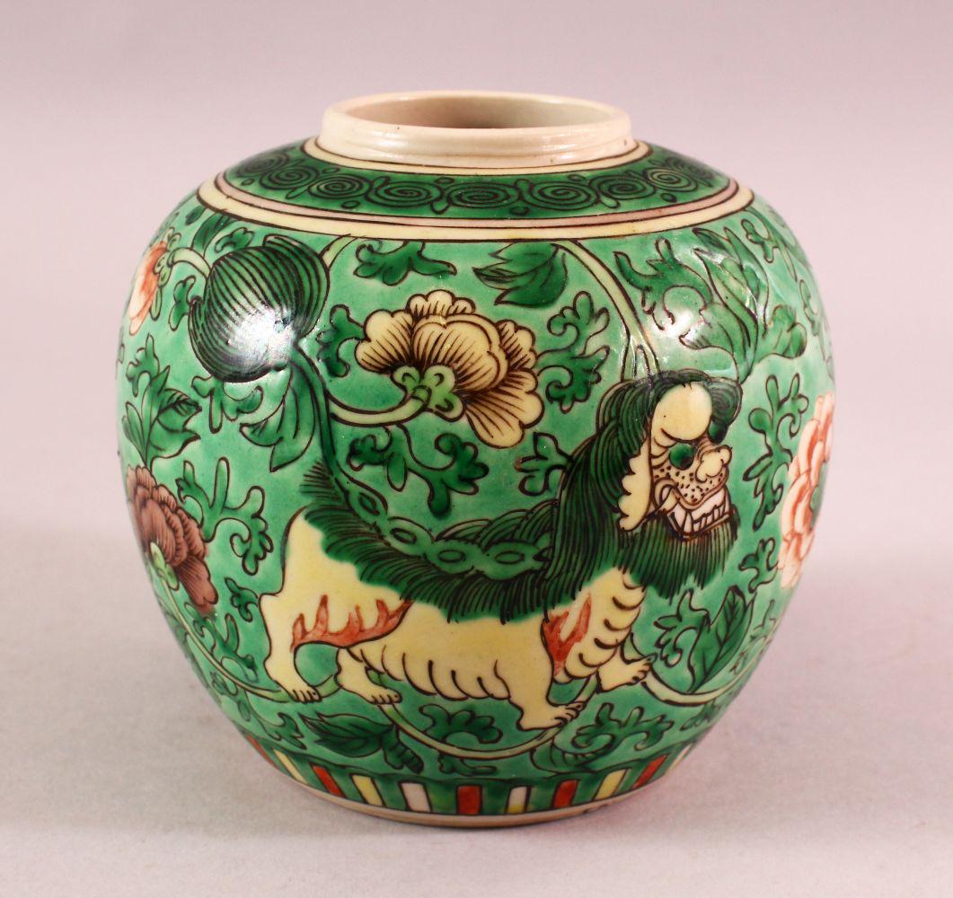 A LATE 19TH CENTURY CHINESE FAMILLE VERTE PORCELAIN: A LATE 19TH CENTURY CHINESE FAMILLE VERTE PORCELAIN JAR, decorated with buddhistic lions and flora, 12cm.