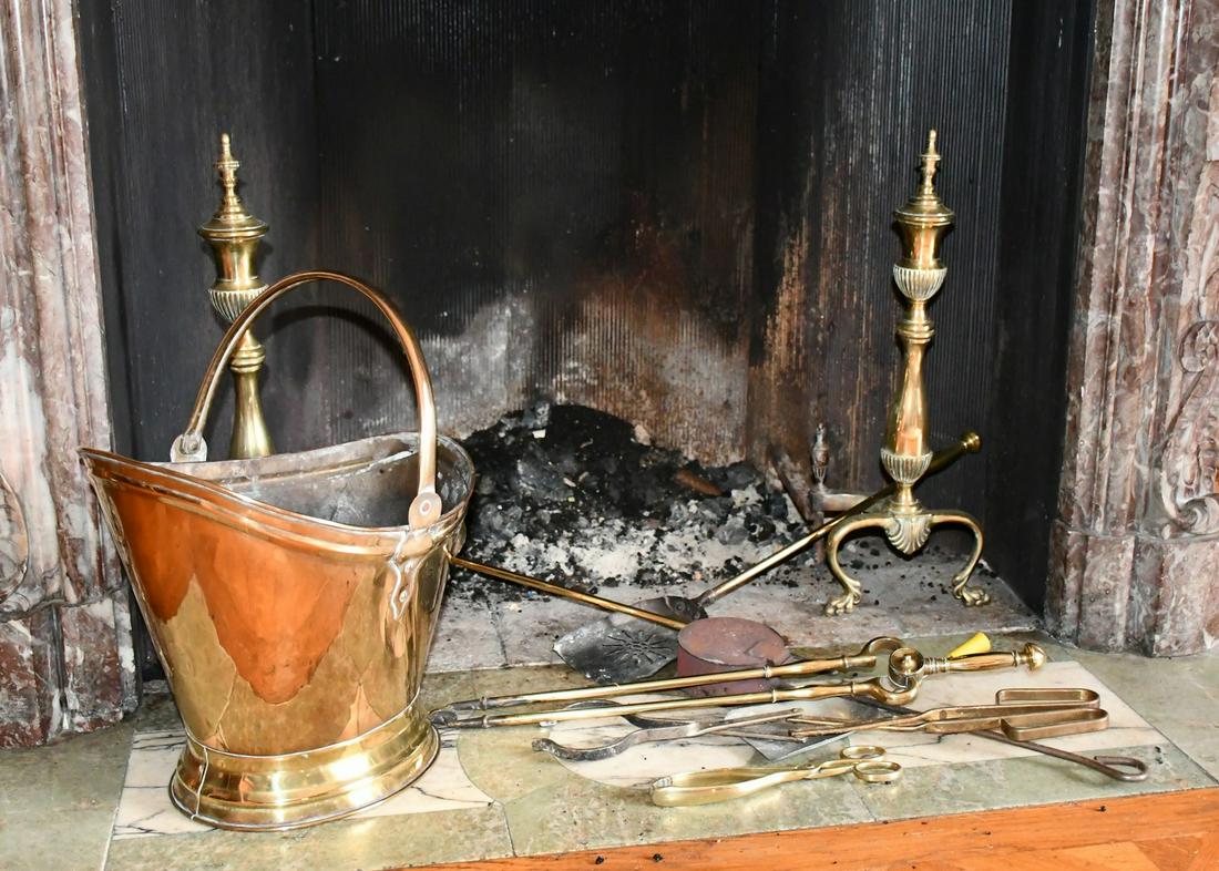 A PAIR OF BRASS ANDIRONS, coal box and fire irons. (1 of 1)