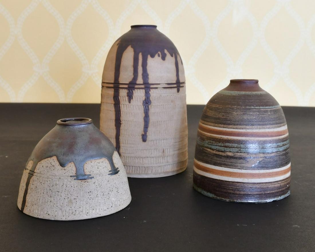 THREE ART POTTERY VASES. (1 of 1)