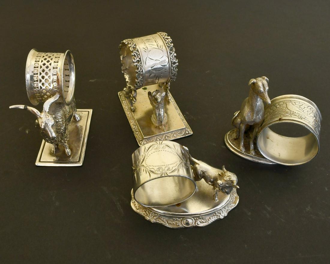FOUR NOVELTY PLATE ANIMAL SERVIETTE RINGS. (1 of 2)