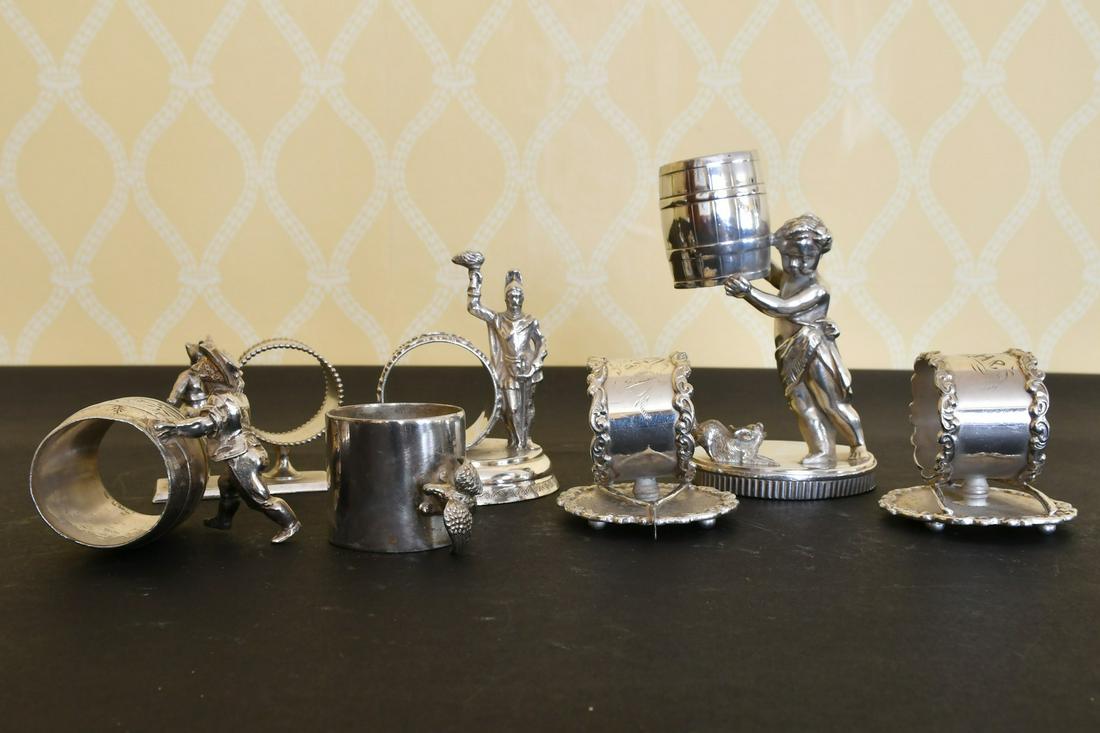 FOUR NOVELTY PLATE FIGURAL SERVIETTE RINGS and THREE (1 of 2)