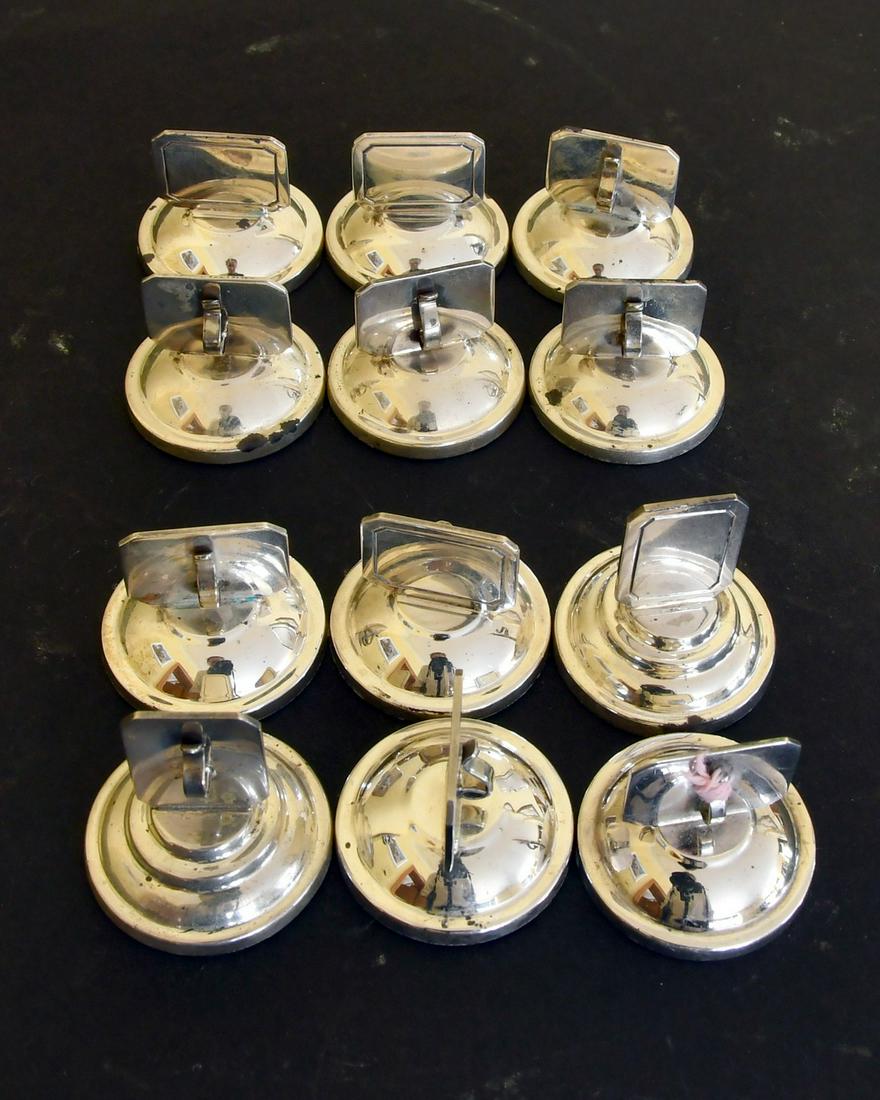 A SET OF TWELVE SMALL SILVER MENU HOLDERS.: A SET OF TWELVE SMALL SILVER MENU HOLDERS.