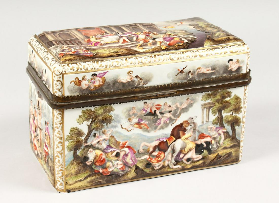A GOOD CAPODIMONTE CASKET with classical figures in: A GOOD CAPODIMONTE CASKET with classical figures in relief 9.5 ins wide.