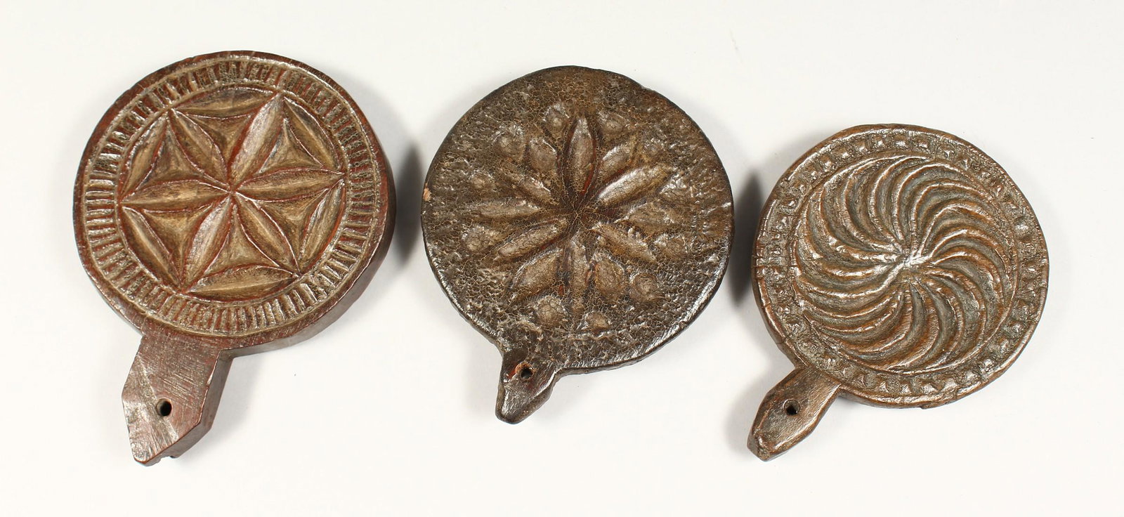 THREE CARVED WOOD CIRCULAR BUTTER MOULDS 4.5ins - 5ins: THREE CARVED WOOD CIRCULAR BUTTER MOULDS 4.5ins - 5ins diameter