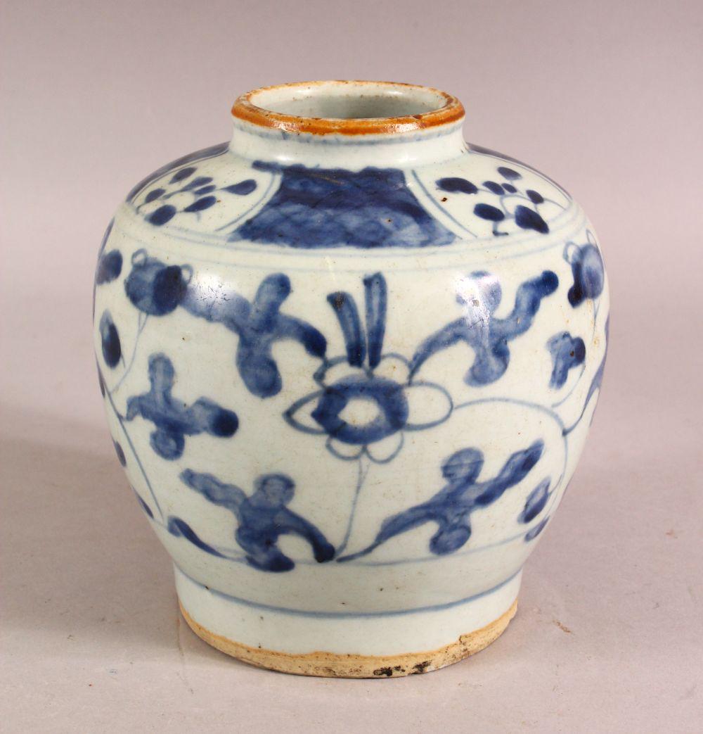 AN 18TH / 19TH CENTURY CHINESE BLUE & WHITE PORCELAIN: AN 18TH / 19TH CENTURY CHINESE BLUE & WHITE PORCELAIN VASE - decorated with stylized flora. 15cm