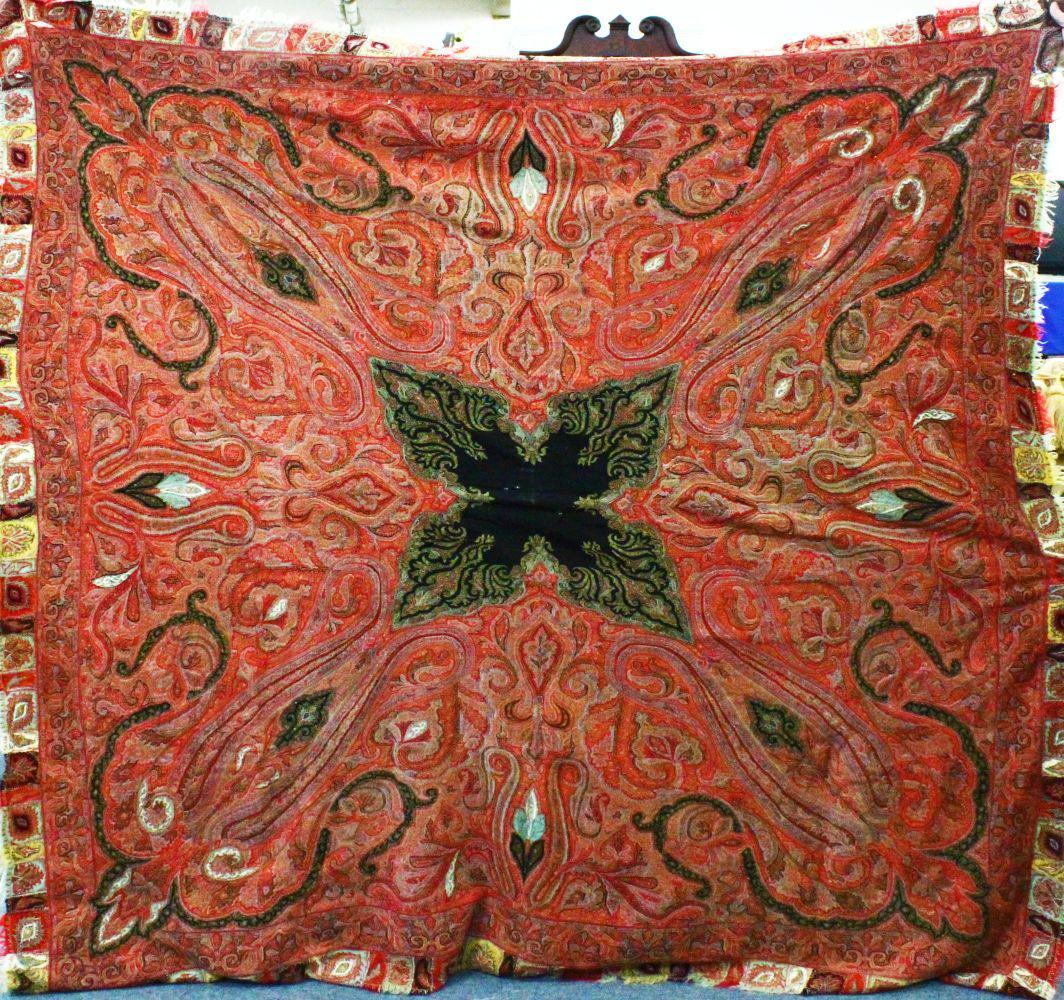 A GOOD LARGE INDIAN PAISLEY SHAWL, hand stitched with (1 of 2)